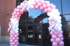 Corporate-breast-cancer-awareness-classic-color-blocked-balloon-arch-with-pink-breast-cancer-ribbon-balloon