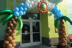 Corporate-grand-opening-palm-tree-sky-and-sun-air-filled-outdoor-balloon-arch