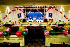 Helium-filled-latex-string-of-pearls-arch-stage-decor-holiday-party