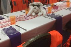 Cruise-themed-mitzvah-estate-table-decor-towel-animal-life-jacket