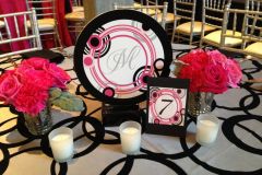 Pink-and-black-themed-mitzvah-custom-centerpiece-custom-printing-pink-flowers