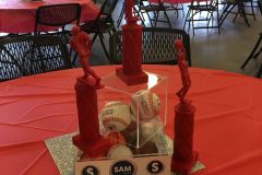 Sports-themed-centerpiece-trophies-and-baseballs