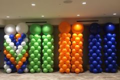 Classic-balloon-columns-monochromatic-swirlpattern-large-round-topper
