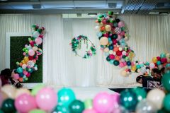 Bridal-fashion-show-stage-decor-organic-garland-with-greenery