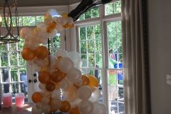 Champagne-bottle-topped-organic-balloon-champagne-bubble-garland-table-decor-Copy