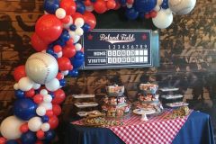 Desert-table-organic-balloon-garland-sports-themed