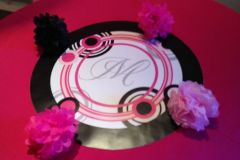 Custom-monogram-centerpiece-with-paper-poofs