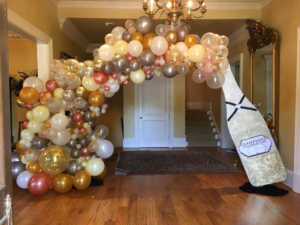 Happy-birthday-large-champange-bottle-organic-balloon-arch-champange-bubbles