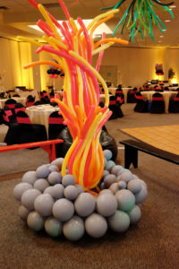 Tiki-themed-room-decor-fire-pit-balloon-sculpture